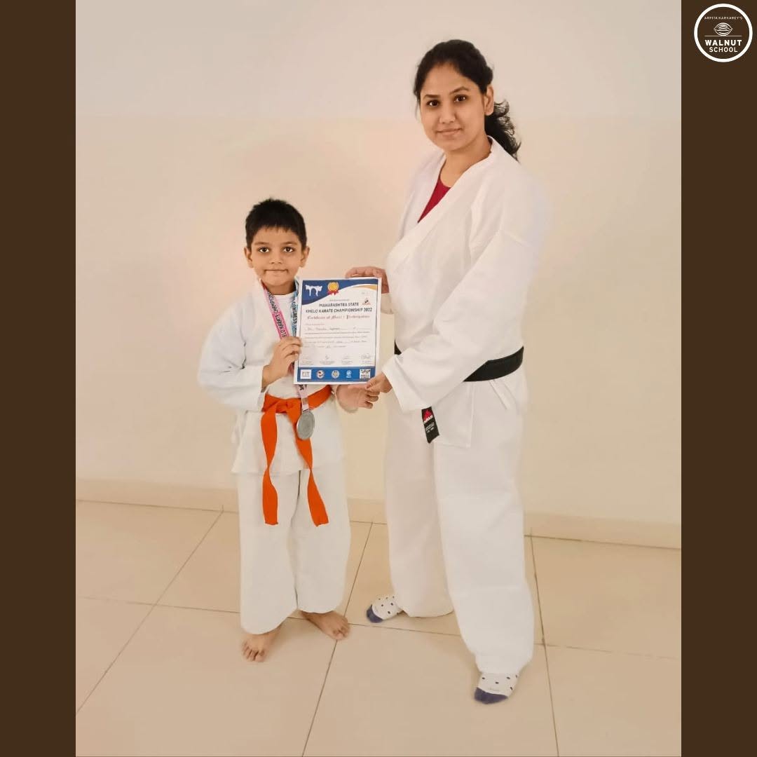 Om Waghmare from Std. 2 Shivane wins silver medal at Khelo Karate Championship 2022